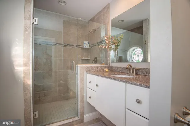 a view of backyard with large trees