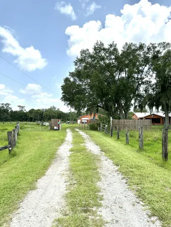 a aerial view of a house with a lake view