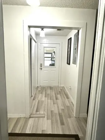a kitchen with stainless steel appliances granite countertop a stove sink and cabinets