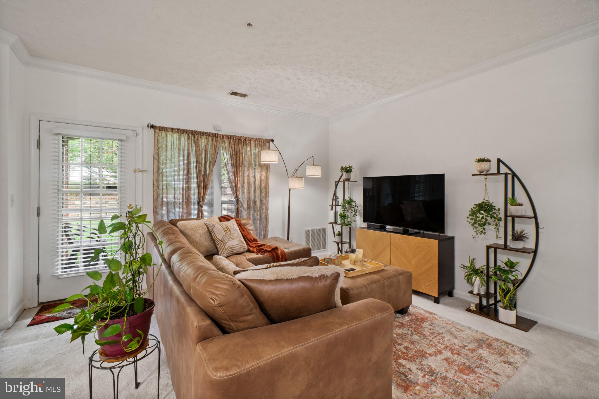 5144 Brightleaf Court, Unit 5144 Rosedale, MD 21237 - Photo 15 of 35 Cozy living space with natural light.