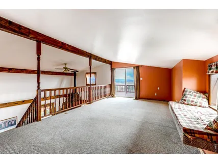 a bedroom with a bed and a table