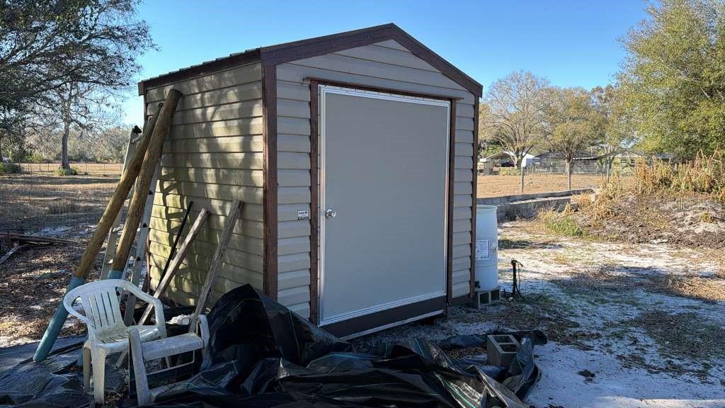 0 North Kraft Road Avon Park, FL 33825 - Photo 3 of 7 a front view of a house with garden