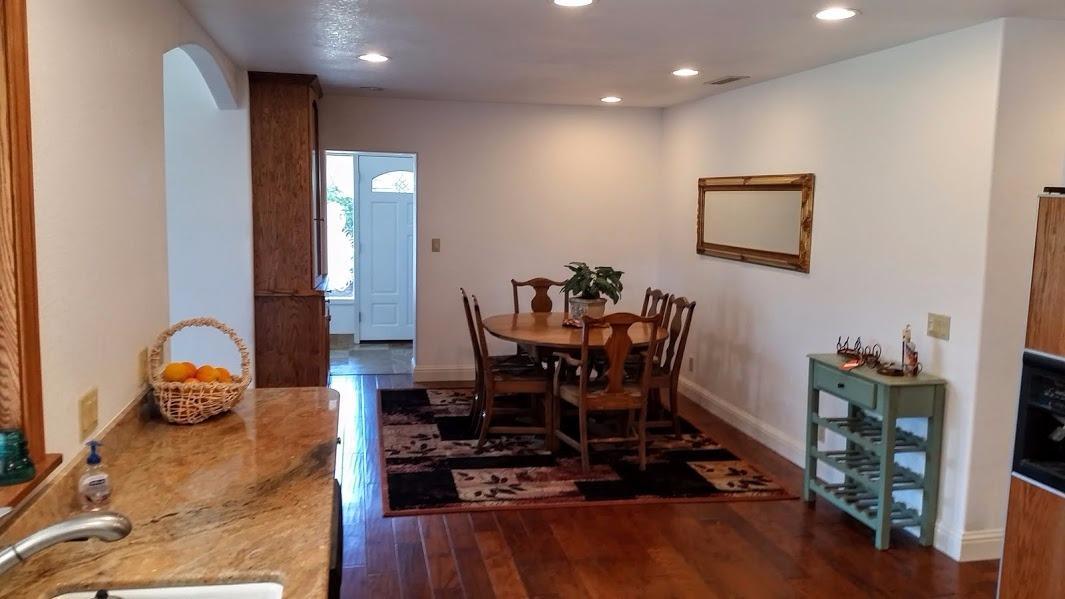 8906 North Applegate Road Grants Pass, OR 97527 - Photo 15 of 33 a dining room with furniture and wooden floor