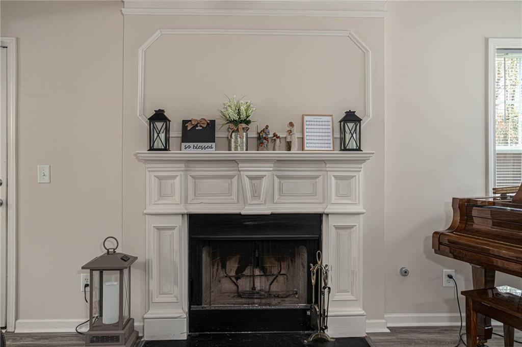 3954 Riverside Parkway Decatur, GA 30034 - Photo 13 of 38 a living room with furniture and a fireplace