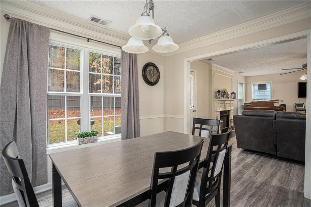 3954 Riverside Parkway Decatur, GA 30034 - Photo 17 of 38 a view of a dining room with furniture window and wooden floor