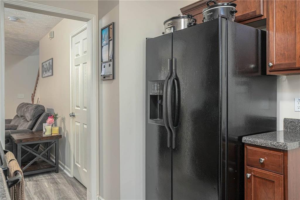 3954 Riverside Parkway Decatur, GA 30034 - Photo 21 of 38 a metallic refrigerator freezer sitting in a kitchen
