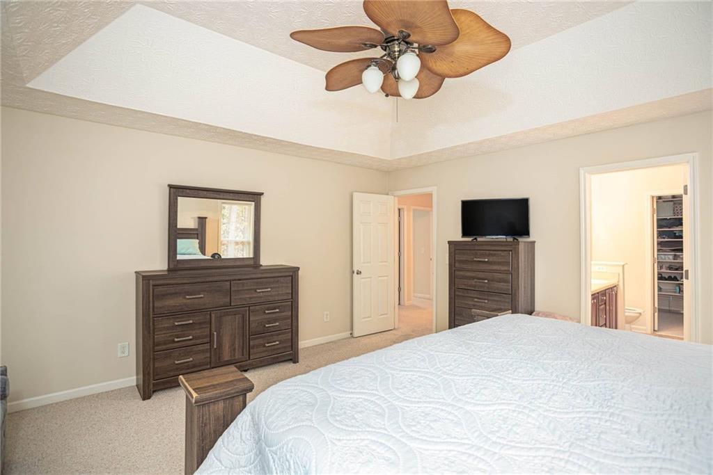 3954 Riverside Parkway Decatur, GA 30034 - Photo 25 of 38 a bedroom with a bed and a dresser