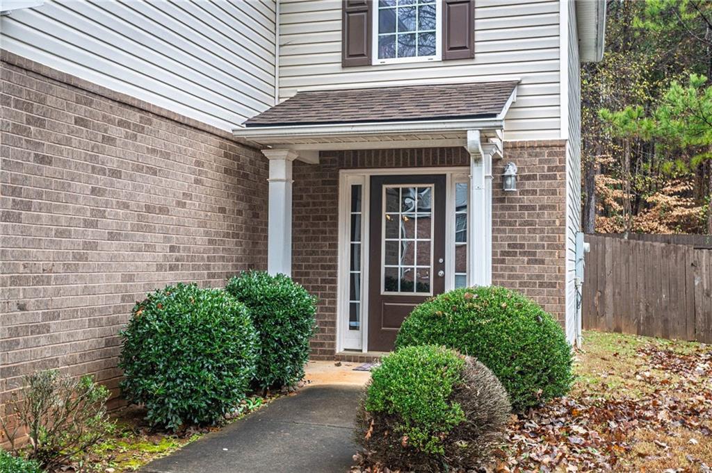 3954 Riverside Parkway Decatur, GA 30034 - Photo 6 of 38 a front view of a house with garden