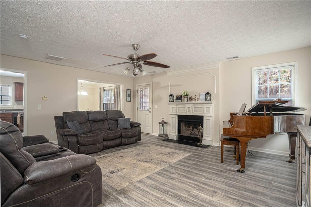 3954 Riverside Parkway Decatur, GA 30034 - Photo 9 of 38 a living room with furniture and a fireplace
