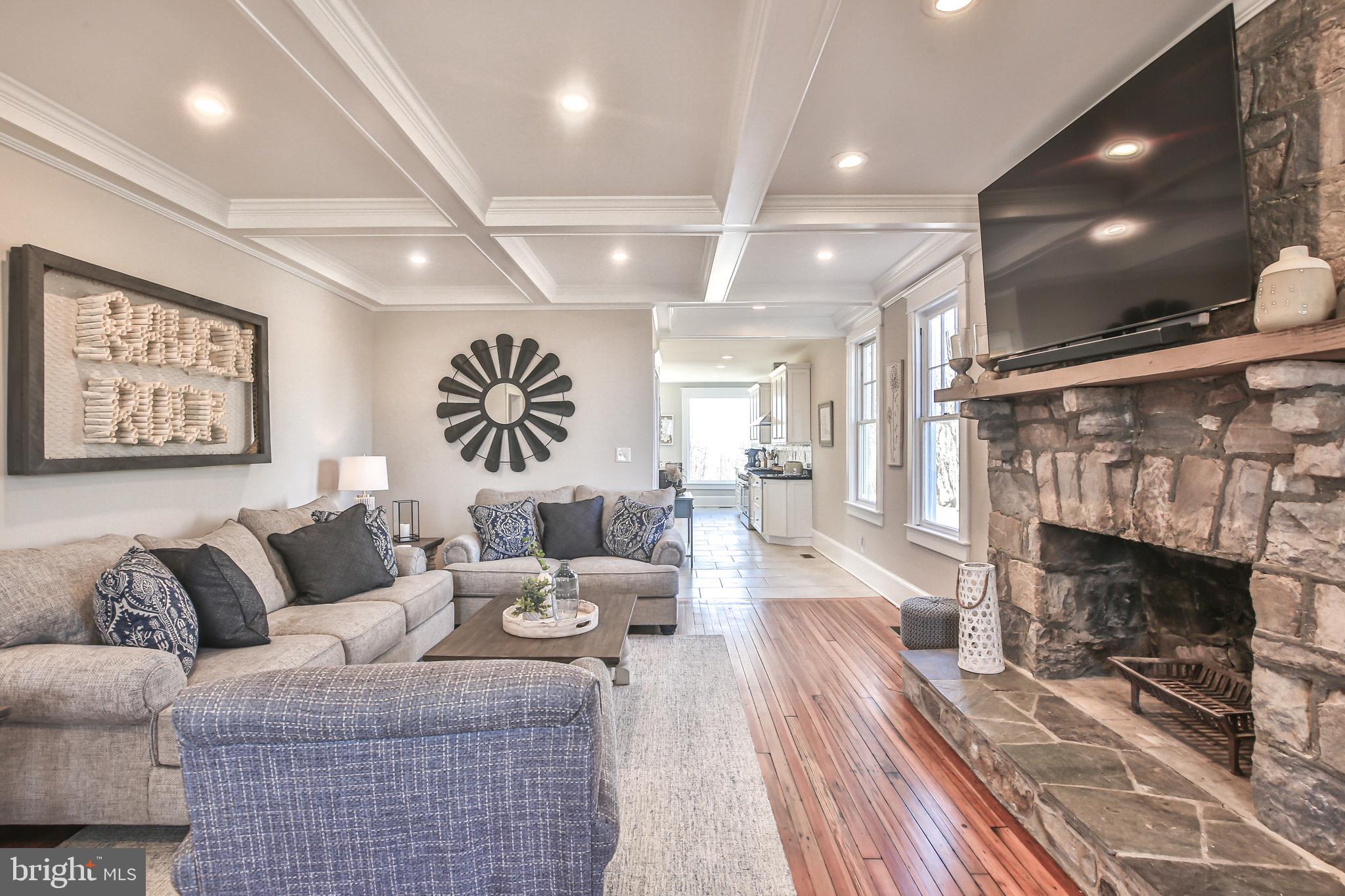 17345 Raven Rocks Road Bluemont, VA 20135 - Photo 20 of 99 a living room with furniture and a fireplace
