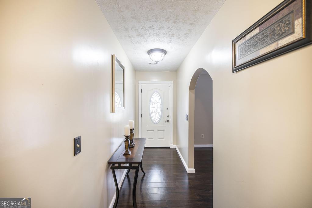 35 Commerce Street Alamo, GA 30411 - Photo 16 of 37 a view of a hallway with entryway door