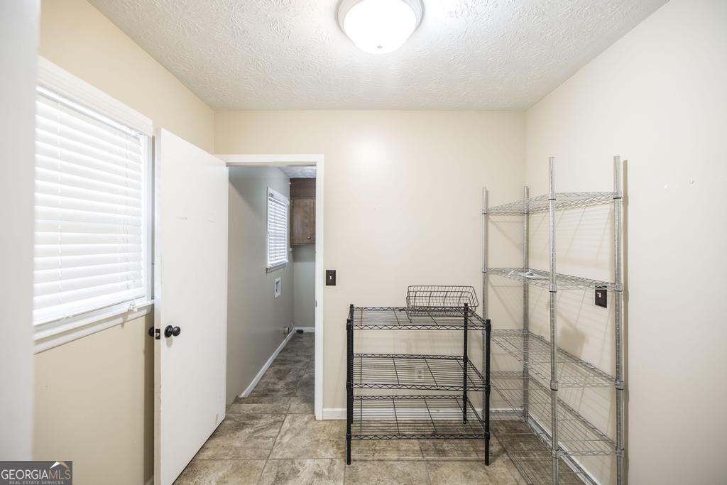 35 Commerce Street Alamo, GA 30411 - Photo 26 of 37 a view of entryway with wooden floor