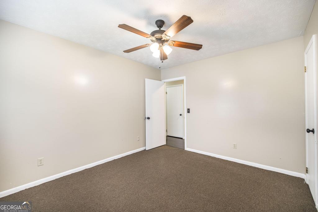 35 Commerce Street Alamo, GA 30411 - Photo 33 of 37 an empty room