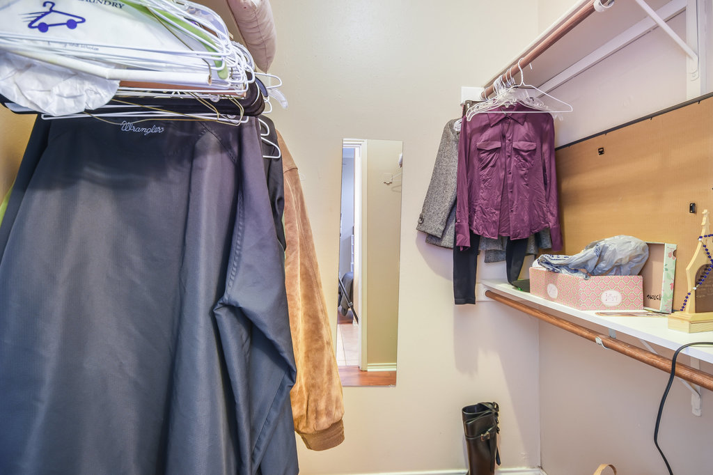 2802 Nueces Street, Unit 312 Austin, TX 78705 - Photo 20 of 22 a view of walk in closet with clothes and shoes