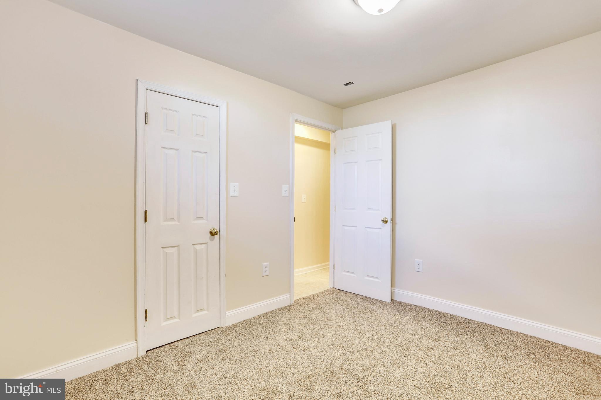 8531 Creek Road Pasadena, MD 21122 - Photo 11 of 29 Basement Bedroom