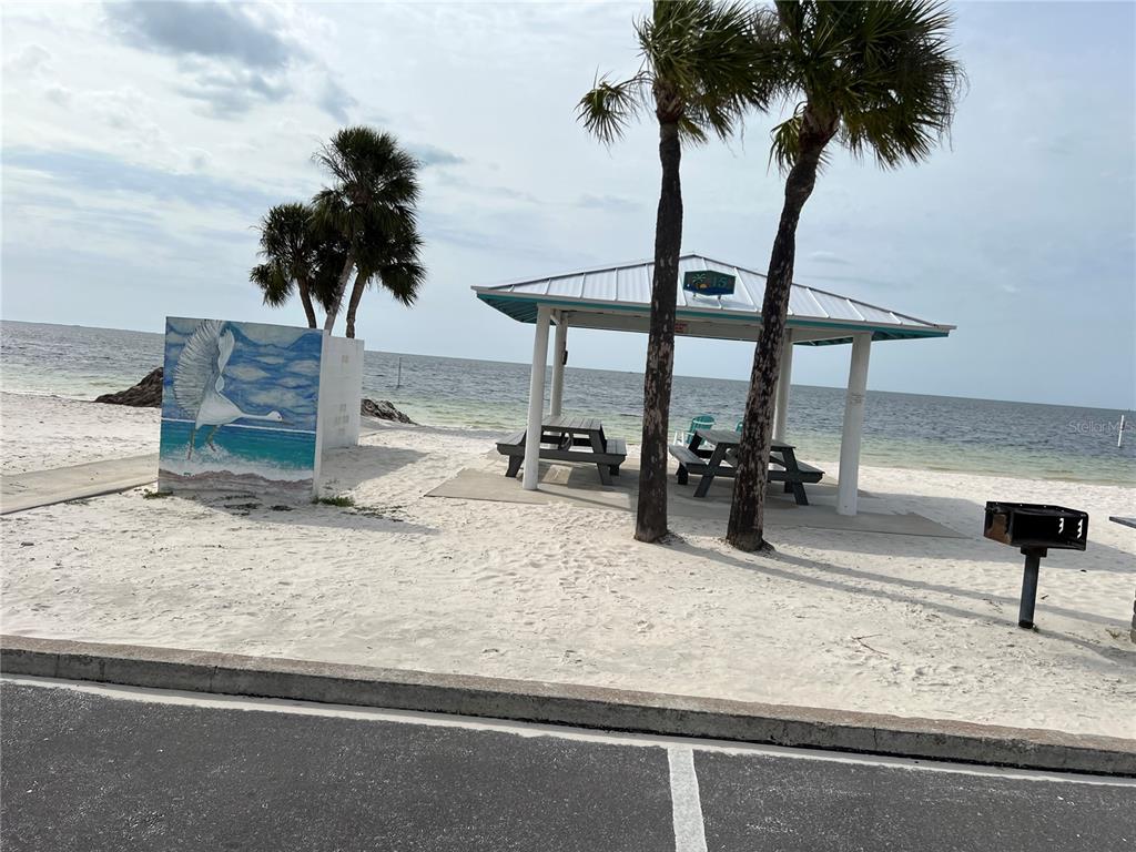 4726 Marine Parkway, Unit 104 New Port Richey, FL 34652 - Photo 11 of 19 a view of a living room and floor to ceiling window