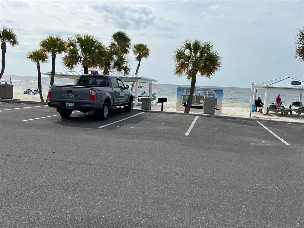 4726 Marine Parkway, Unit 104 New Port Richey, FL 34652 - Photo 17 of 19 a view of street with parked cars