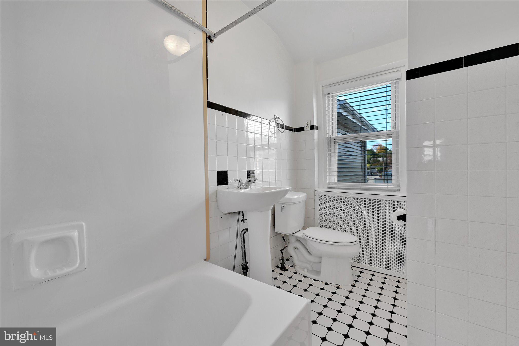 2814 St Marys Road Ardmore, PA 19003 - Photo 11 of 21 a bathroom with a sink toilet and shower