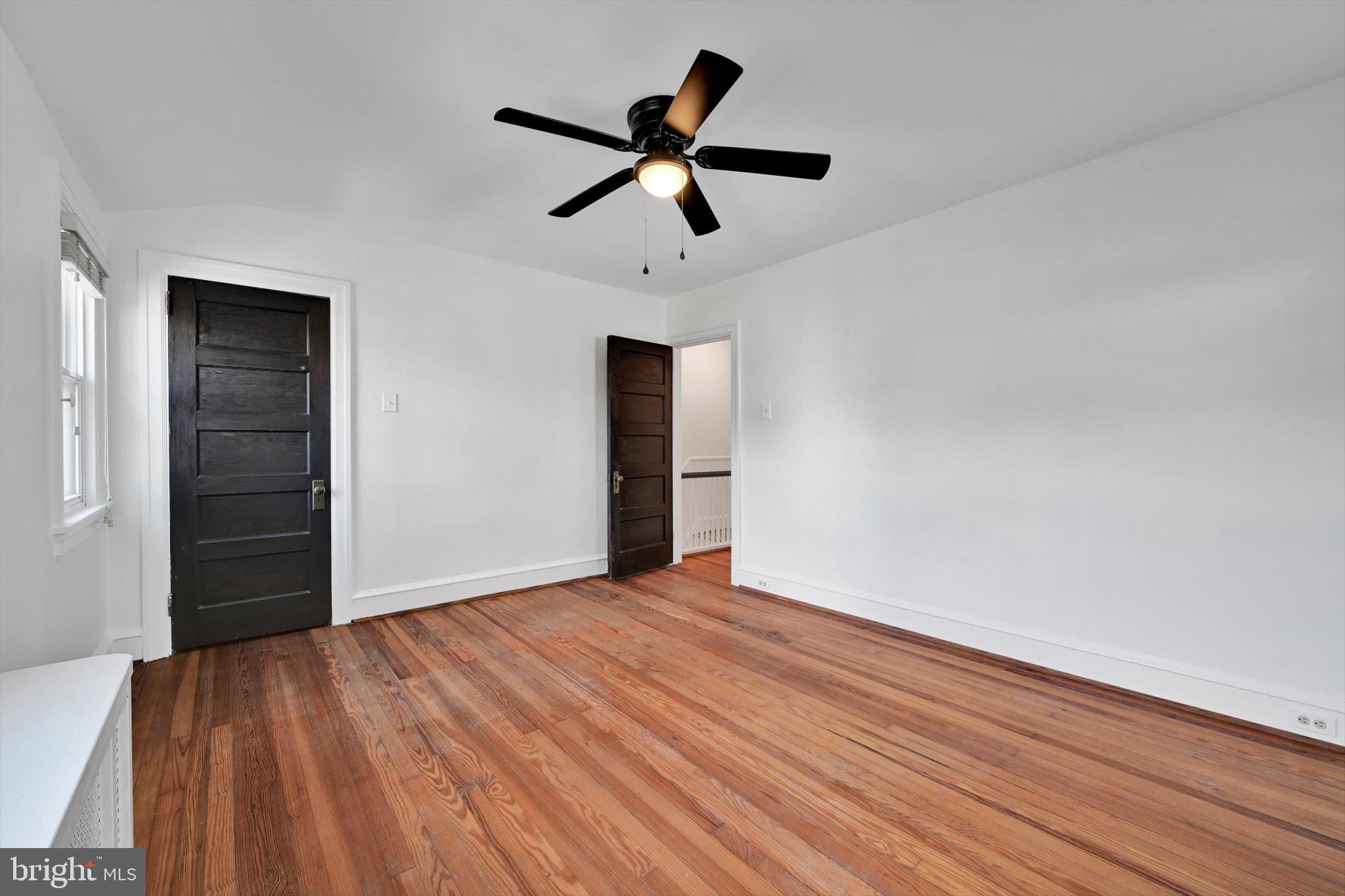 2814 St Marys Road Ardmore, PA 19003 - Photo 12 of 21 wooden floor in an empty room with a window