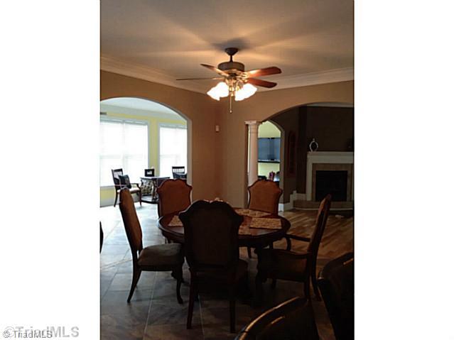 647 Scout Road Lexington, NC 27292 - Photo 8 of 11 Breakfast. Breakfast Nook looks into sunroom and view of the lake