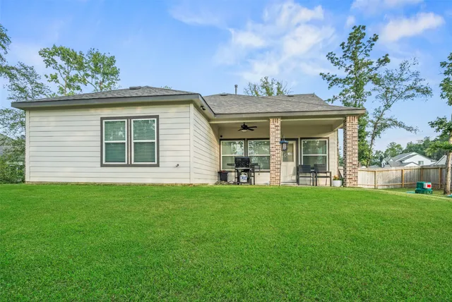 a view of a house with a garden