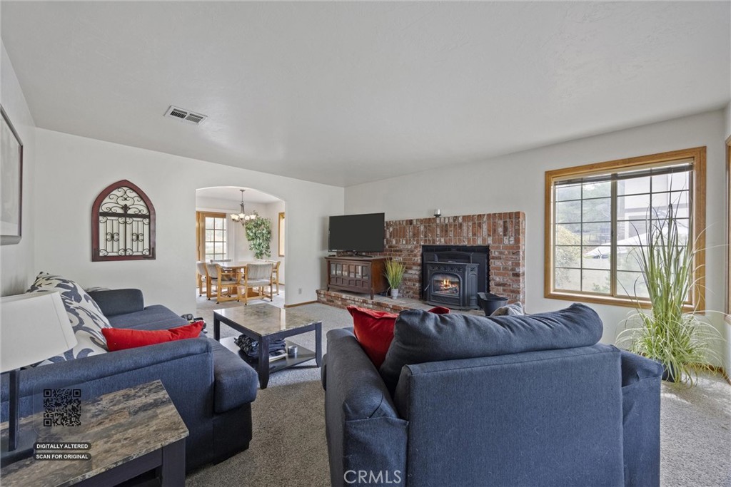 3512 McCray Road Mountain Mesa, CA 93240 - Photo 15 of 60 a living room with furniture and a fireplace