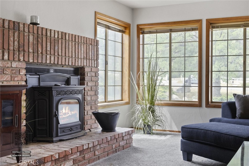 3512 McCray Road Mountain Mesa, CA 93240 - Photo 18 of 60 a living room with furniture a fireplace and a floor to ceiling window