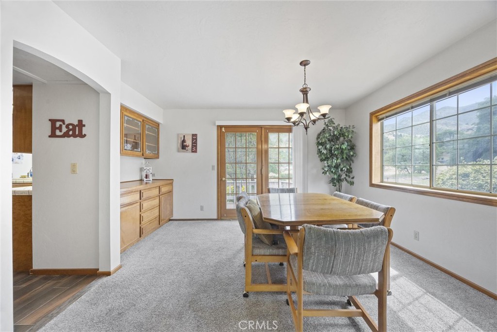 3512 McCray Road Mountain Mesa, CA 93240 - Photo 20 of 60 a dining room with furniture window and wooden floor