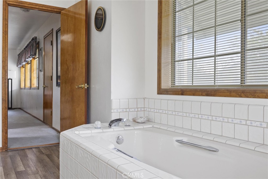 3512 McCray Road Mountain Mesa, CA 93240 - Photo 45 of 60 a bathroom with a sink and a shower