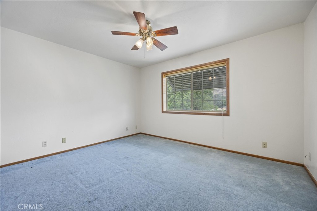 3512 McCray Road Mountain Mesa, CA 93240 - Photo 50 of 60 an empty room with a window and a fan