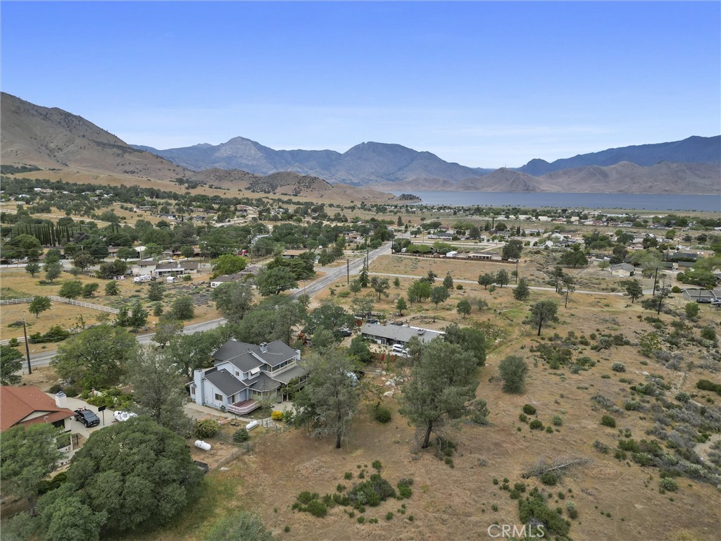3512 McCray Road Mountain Mesa, CA 93240 - Photo 7 of 60 a view of a lush green hillside and houses