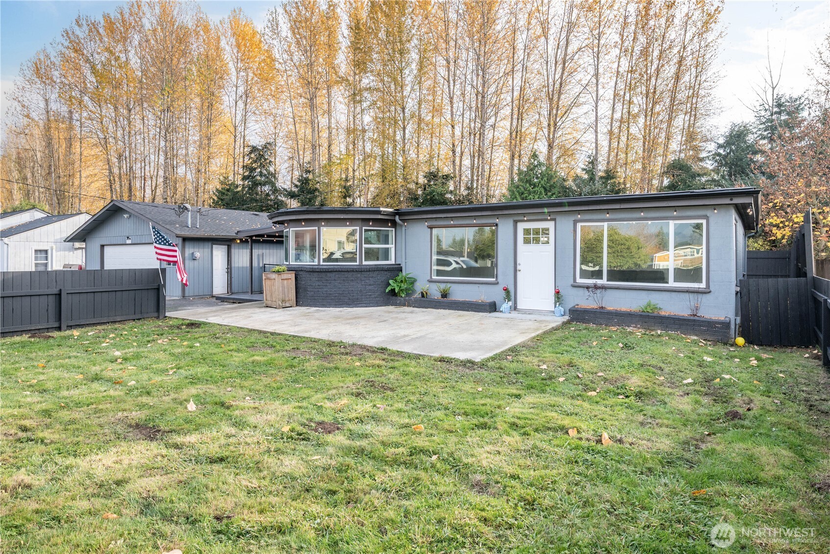 front view of a house with a yard