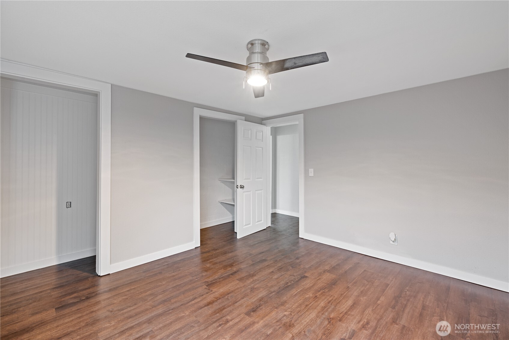3317 Olive Way Longview, WA 98632 - Photo 13 of 29 a view of empty room with wooden floor