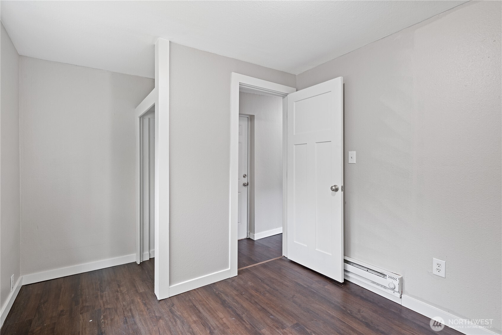 3317 Olive Way Longview, WA 98632 - Photo 21 of 29 a view of an empty room with wooden floor