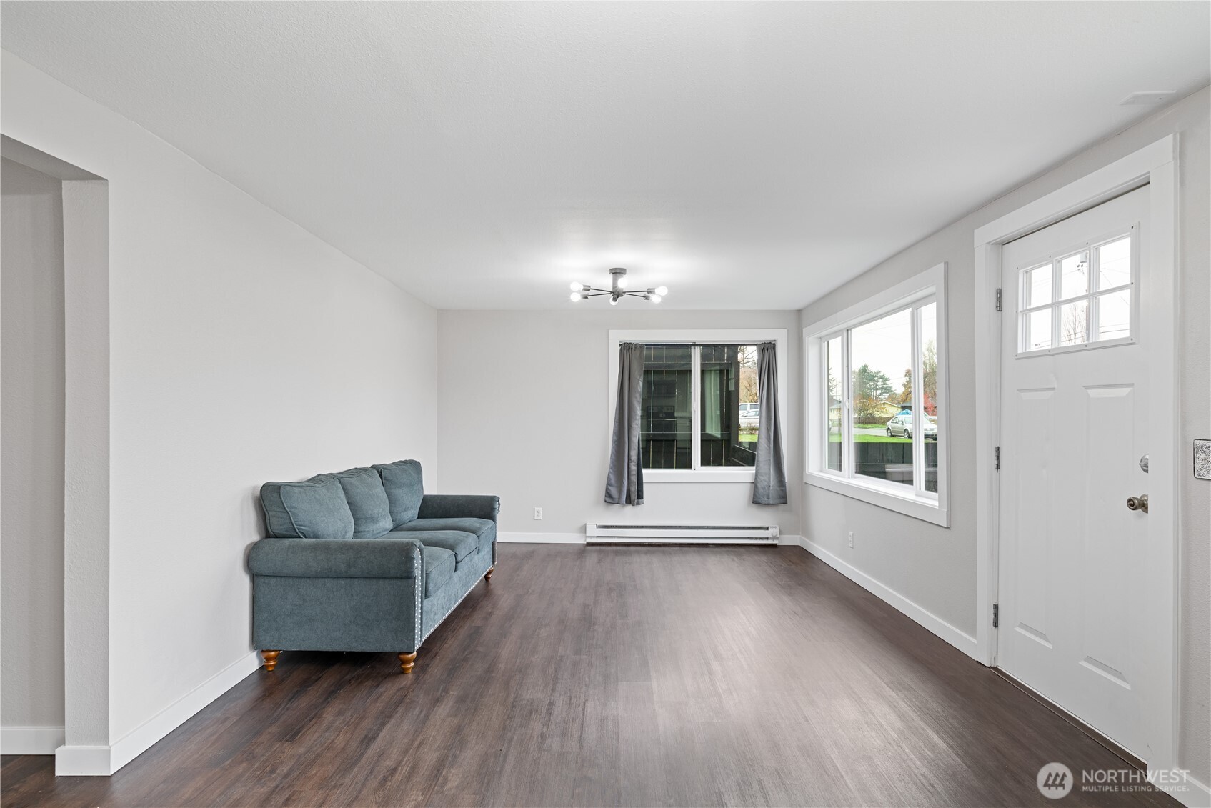 3317 Olive Way Longview, WA 98632 - Photo 5 of 29 a living room with furniture and a large window