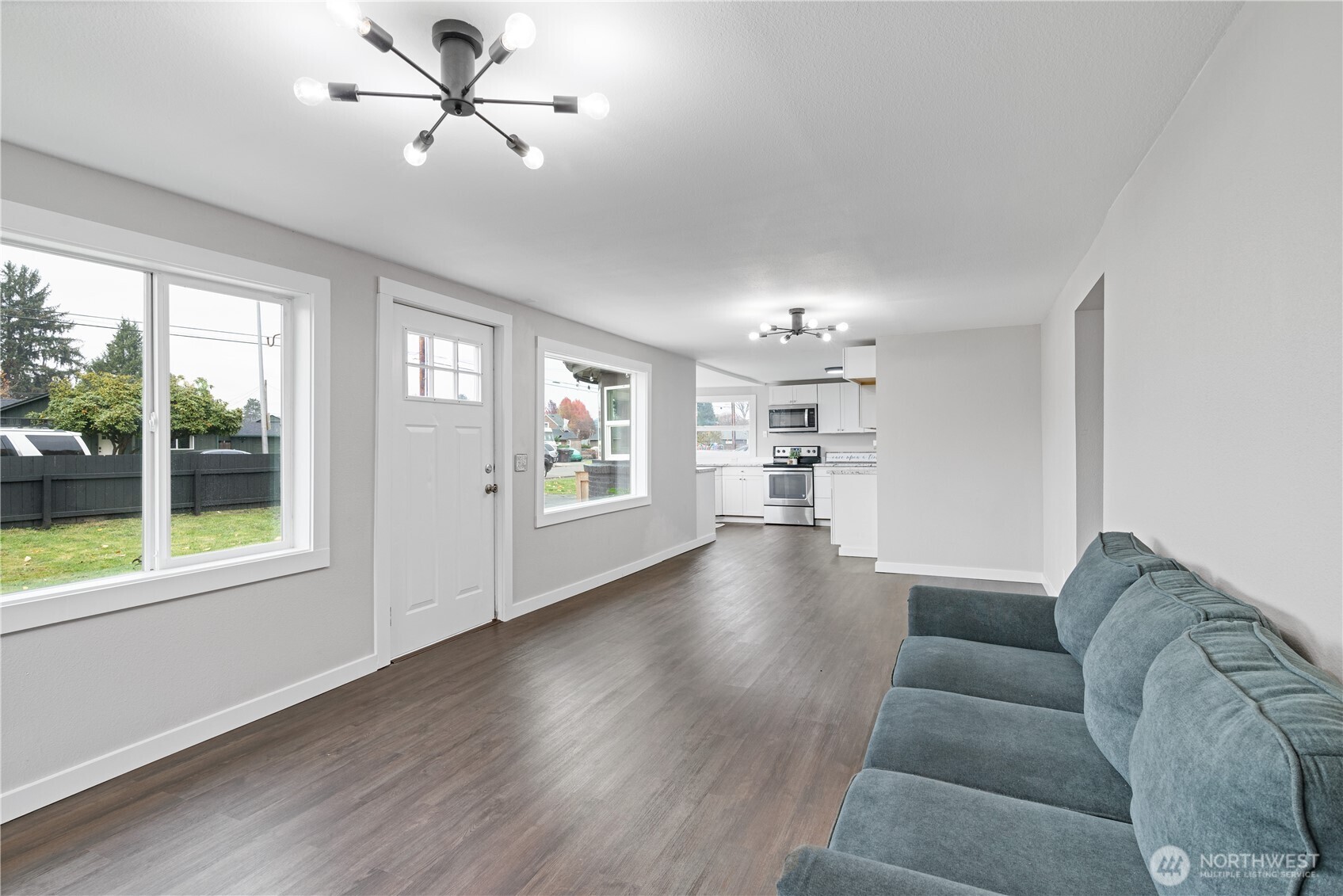 3317 Olive Way Longview, WA 98632 - Photo 7 of 29 a living room with furniture and a large window