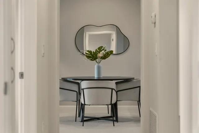 a vase of flowers sitting on a table