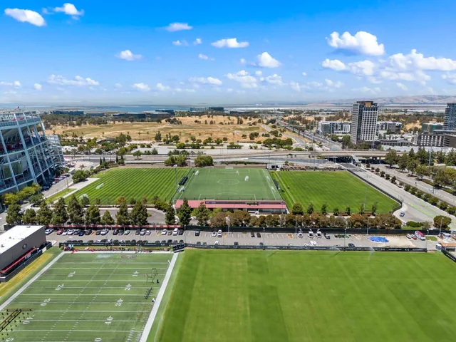 a view of a city with an ocean