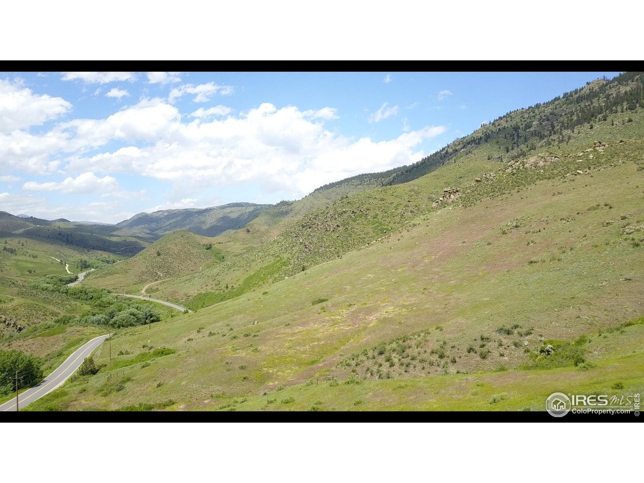 14750 Buckhorn Road Loveland, CO 80538 - Photo 10 of 39 a view of an outdoor space and mountain view