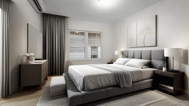 a bedroom with a bed and lamp