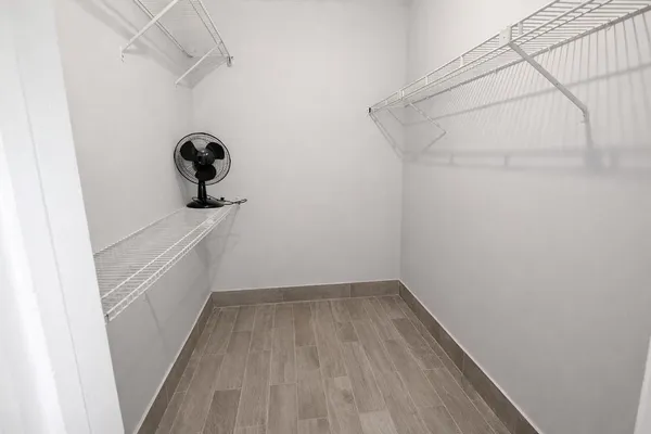 a view of a room with racks on the wall