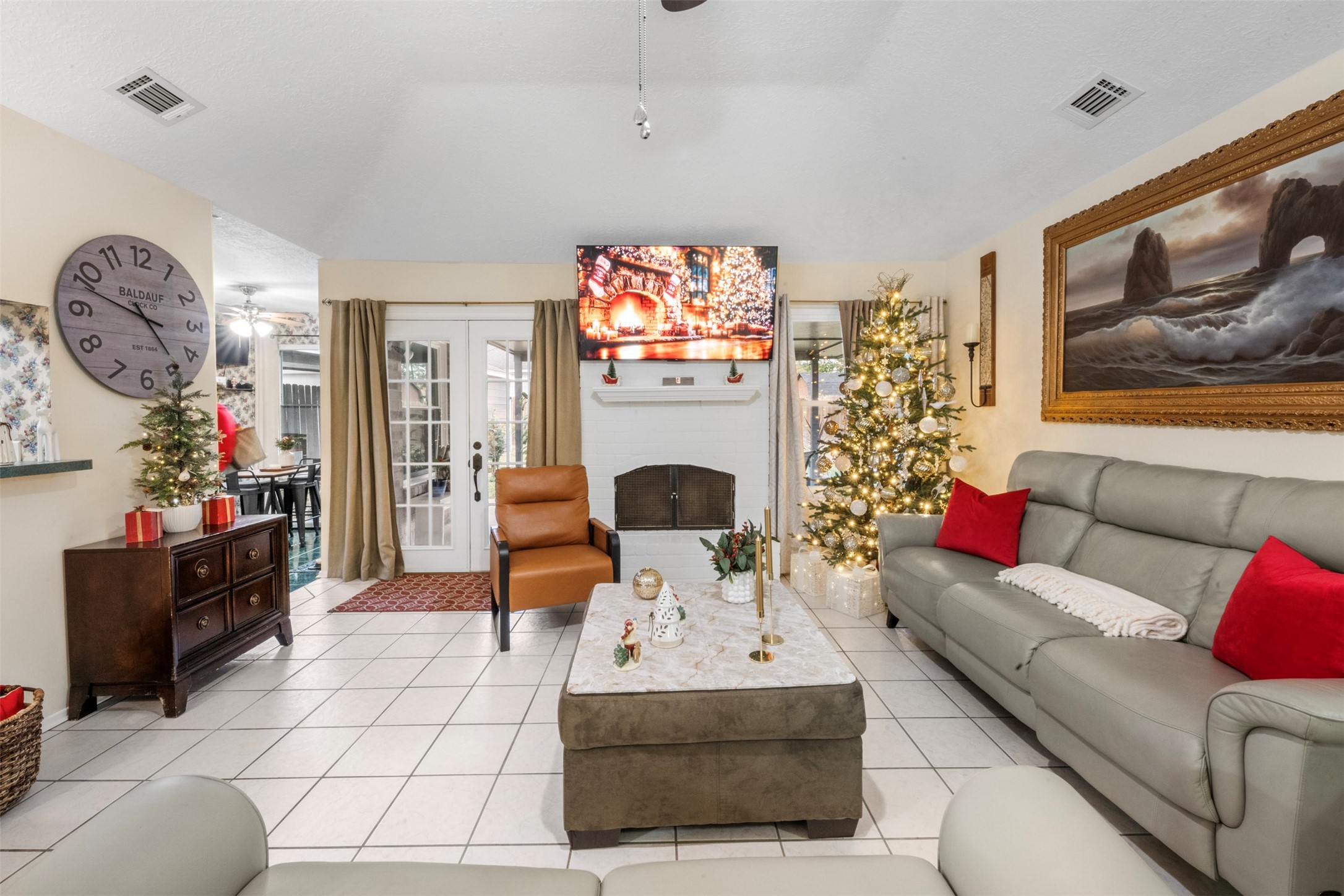 1114 Poppets Way Crosby, TX 77532 - Photo 11 of 48 Tile flooring anchors the living room, creating a bright, clean foundation for comfortable everyday living.