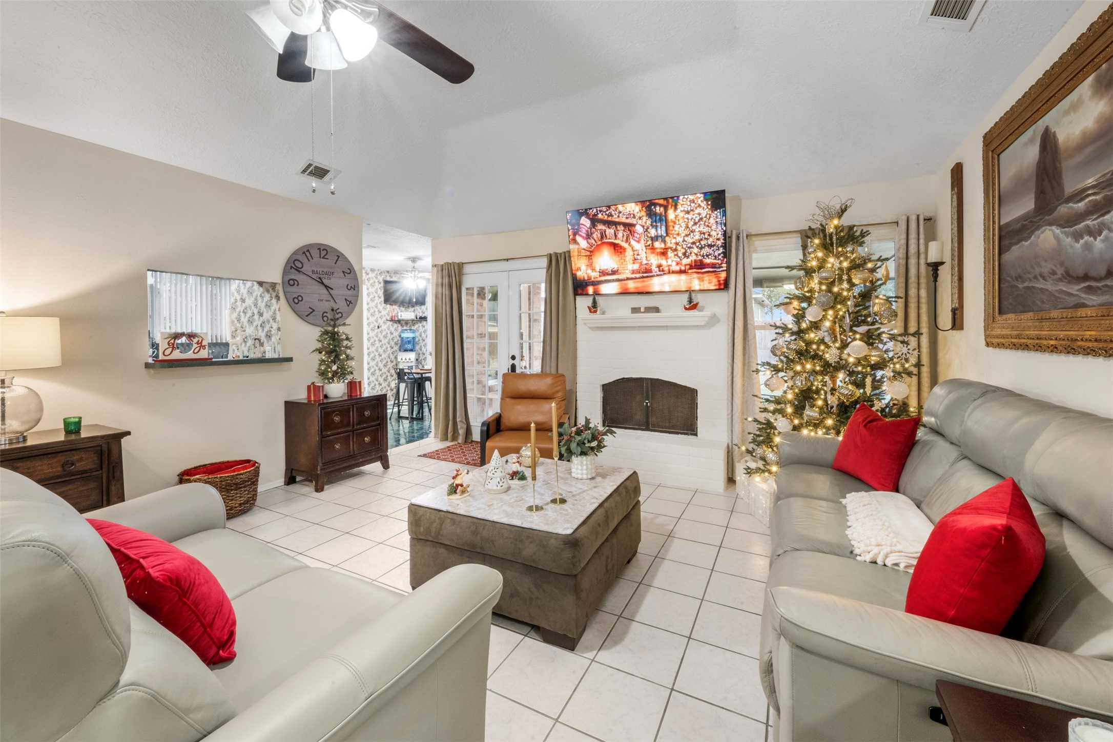 1114 Poppets Way Crosby, TX 77532 - Photo 12 of 48 Entry view of the living room featuring tile flooring.