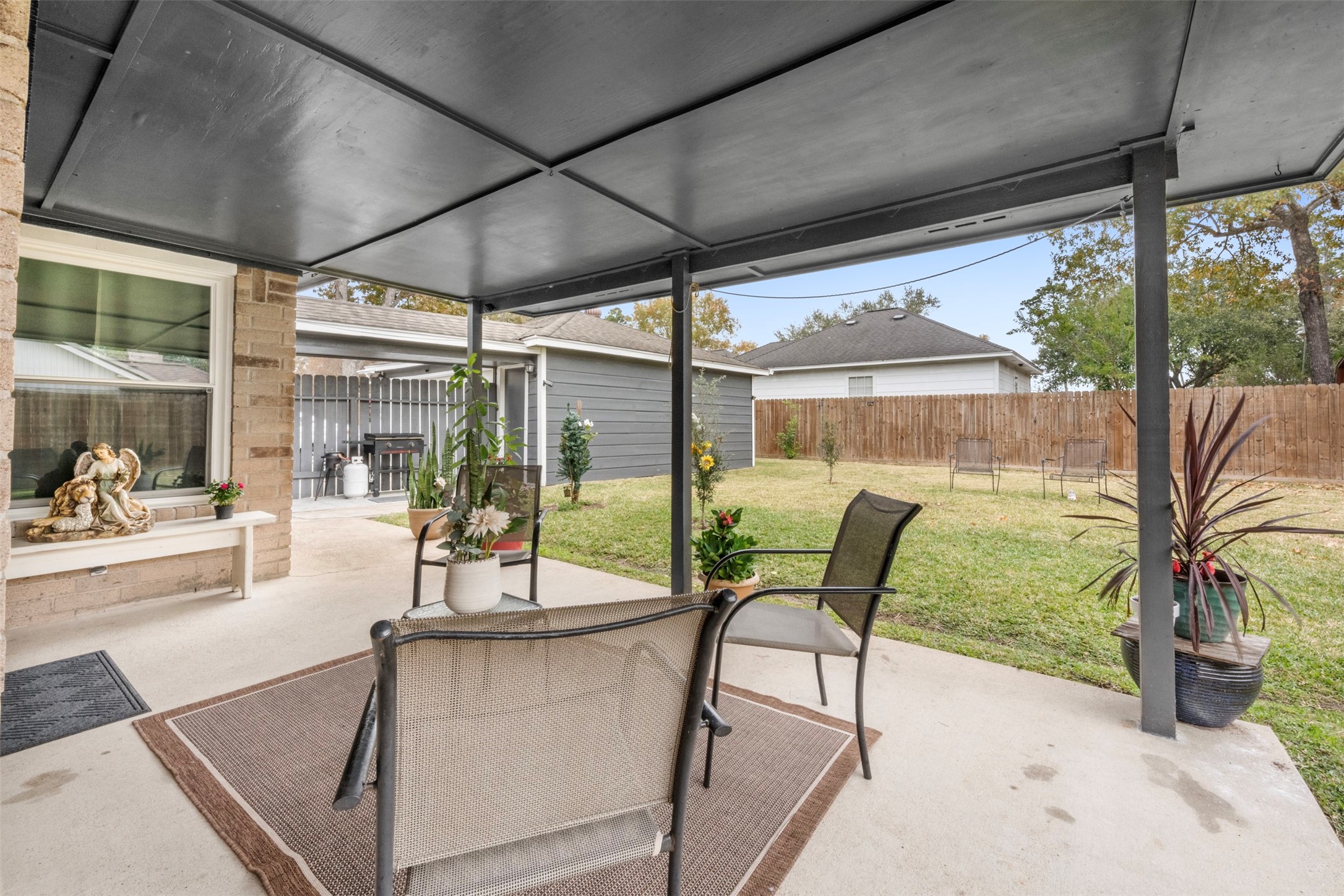 1114 Poppets Way Crosby, TX 77532 - Photo 34 of 48 Perfect patio for entertainment and outdoor grilling.