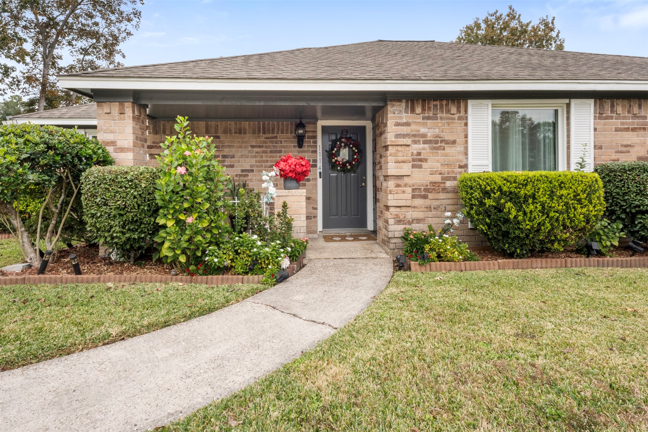 1114 Poppets Way Crosby, TX 77532 - Photo 6 of 48 Inviting curb appeal with mature landscaping.