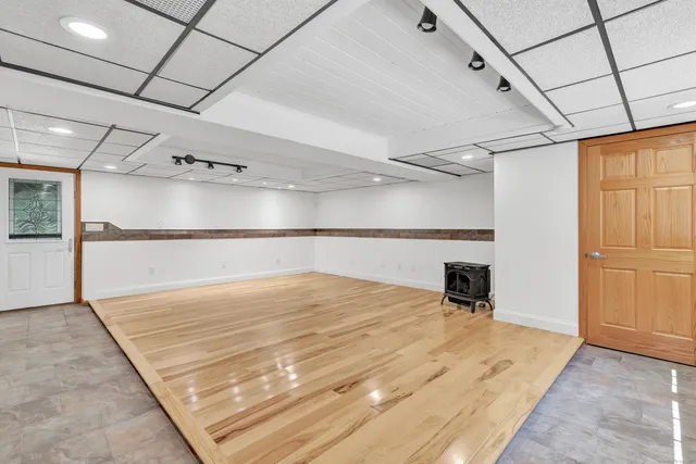 a view of a room with a flat screen tv