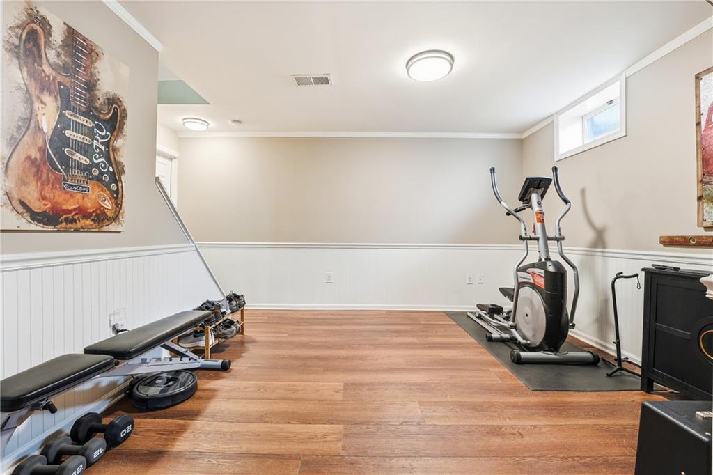 267 Forsythe Road Mars, PA 16046 - Photo 31 of 41 a room with gym equipment and wooden floor