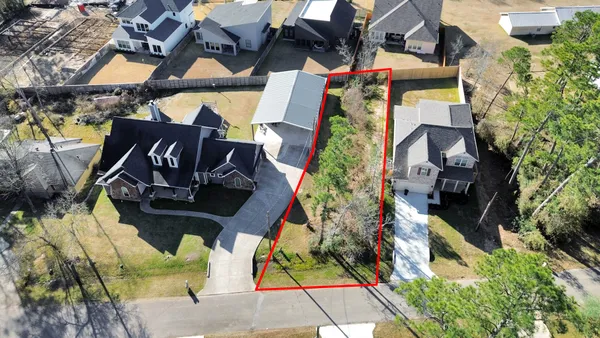 an aerial view of a house with a garden