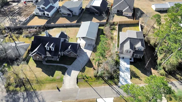 an aerial view of a house with garden