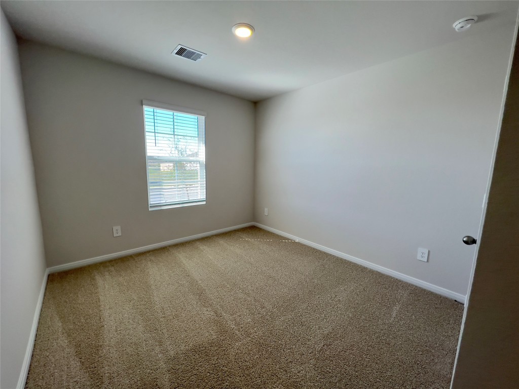314 Addison Place Lockhart, TX 78644 - Photo 22 of 33 an empty room with a window